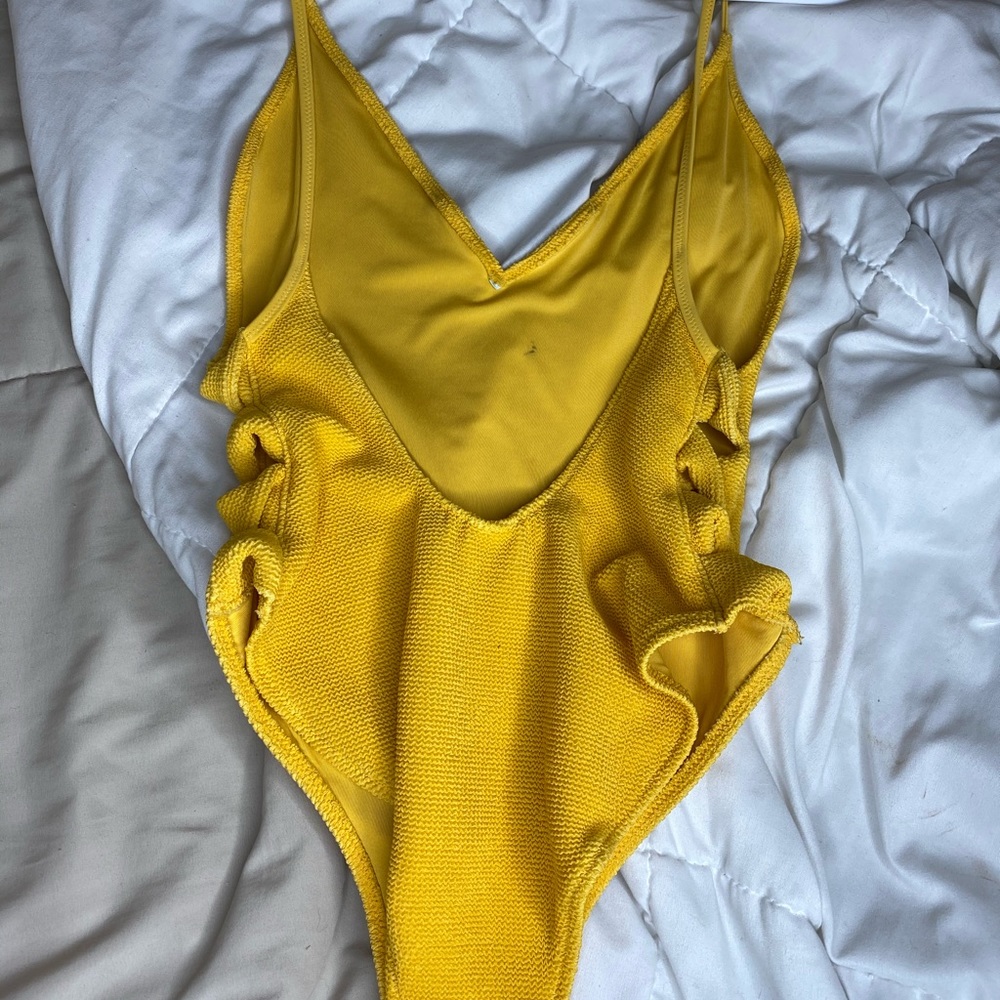 Yellow body suit